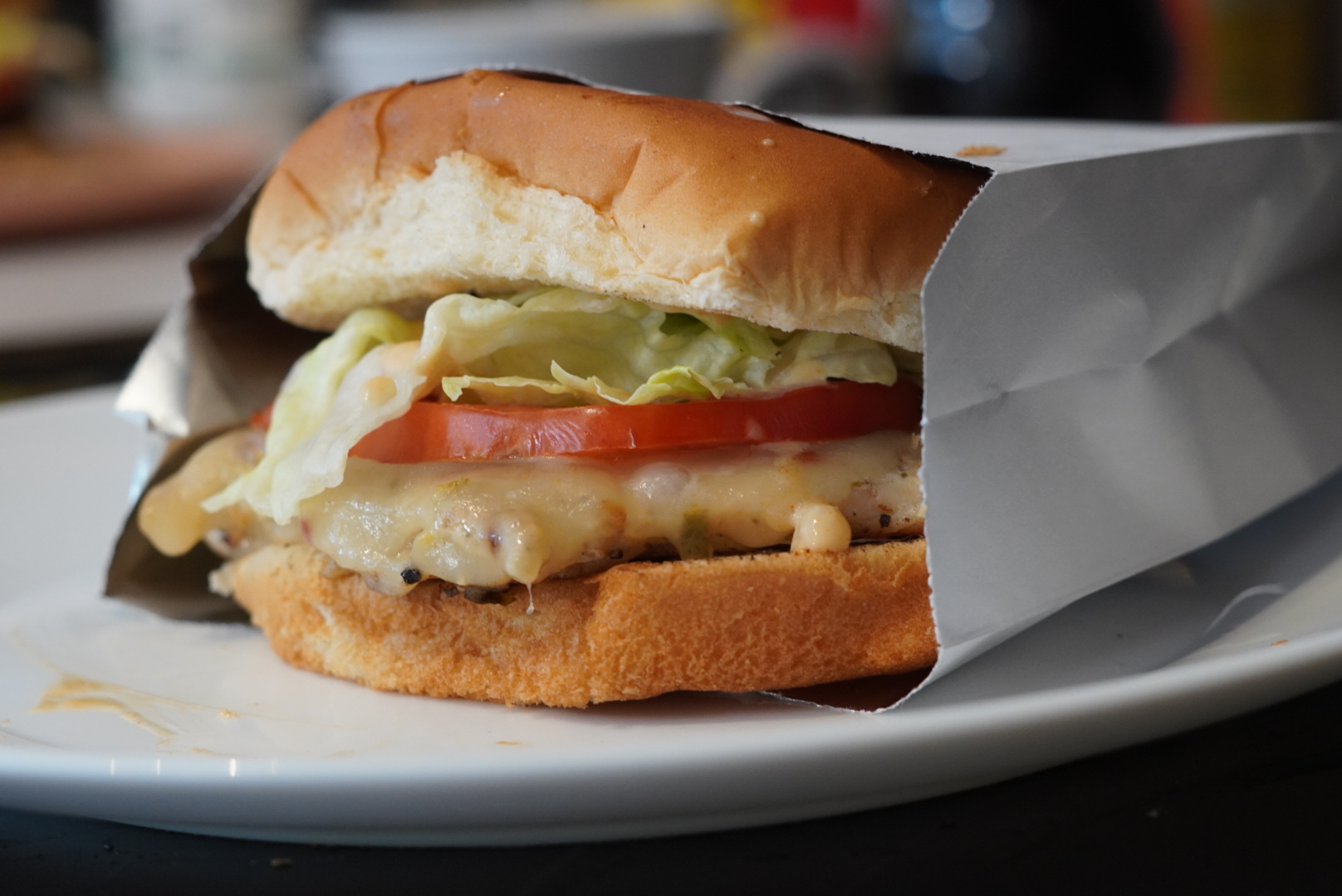 An extremely tasty Slappin Chicken Sandwich from Slappy McPappy's all wrapped up in a nice to go bag. Stop by to grab one for yourself in Belton, Raymore, or Peculiar