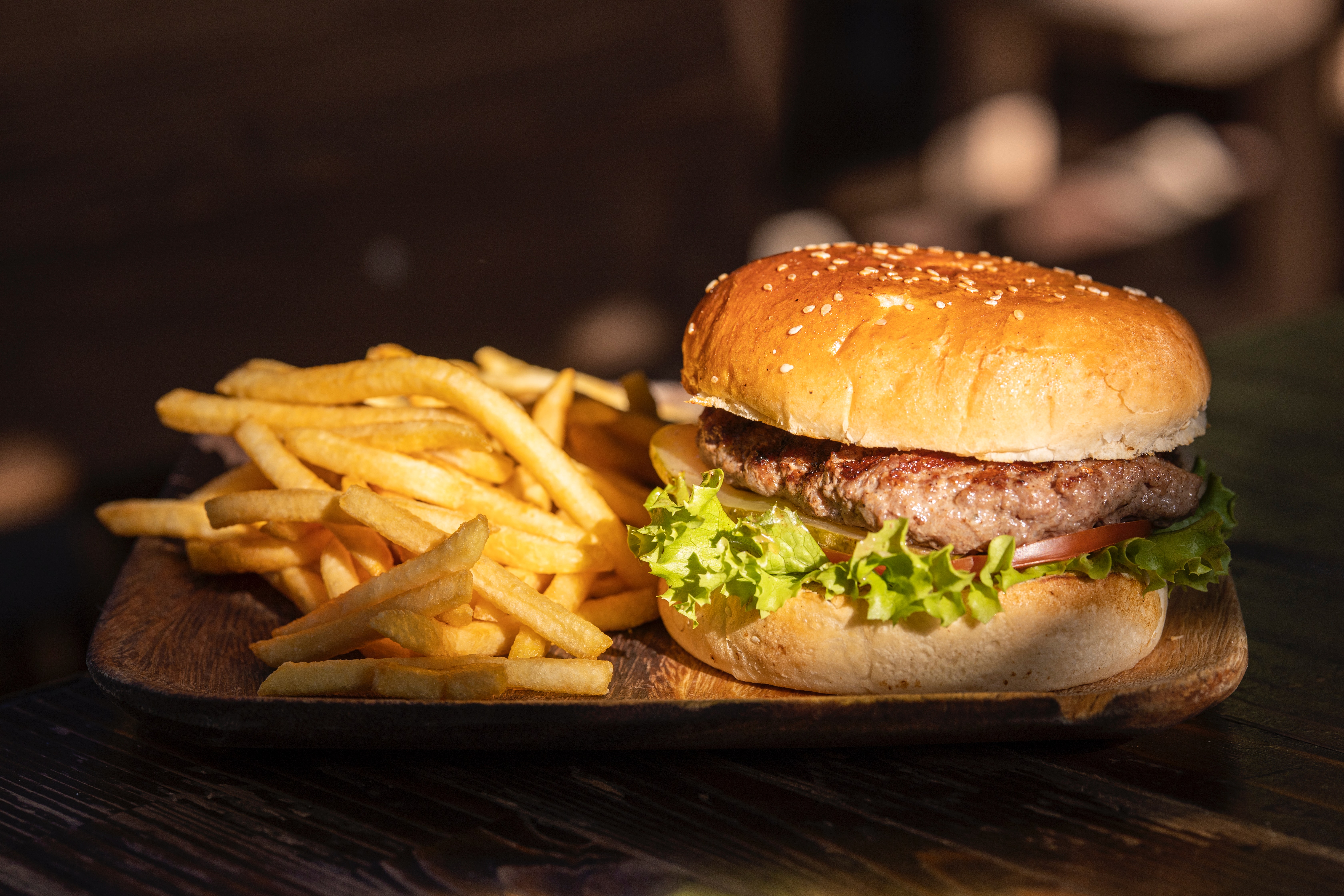 A tasty looking photo of a burger and fries